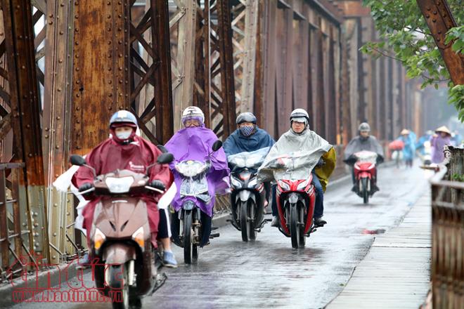 Hà Nội rét đậm, người lao động tê cóng trong mưa lạnh ảnh 7