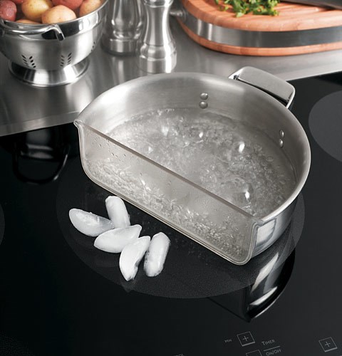 Phải làm sao với xoong, chảo inox mà bếp từ không nhận? ảnh 1