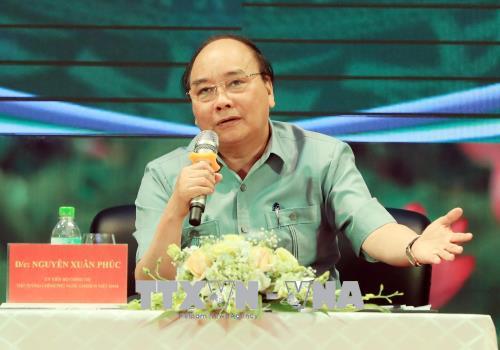 Thủ tướng Nguyễn Xuân Phúc phát biểu tại buổi đối thoại. Ảnh: Thống Nhất/TTXVN